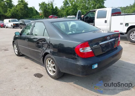 2003 Toyota Camry Xle z USA, uszkodzony, nr VIN 4T1BE30KX3U197331